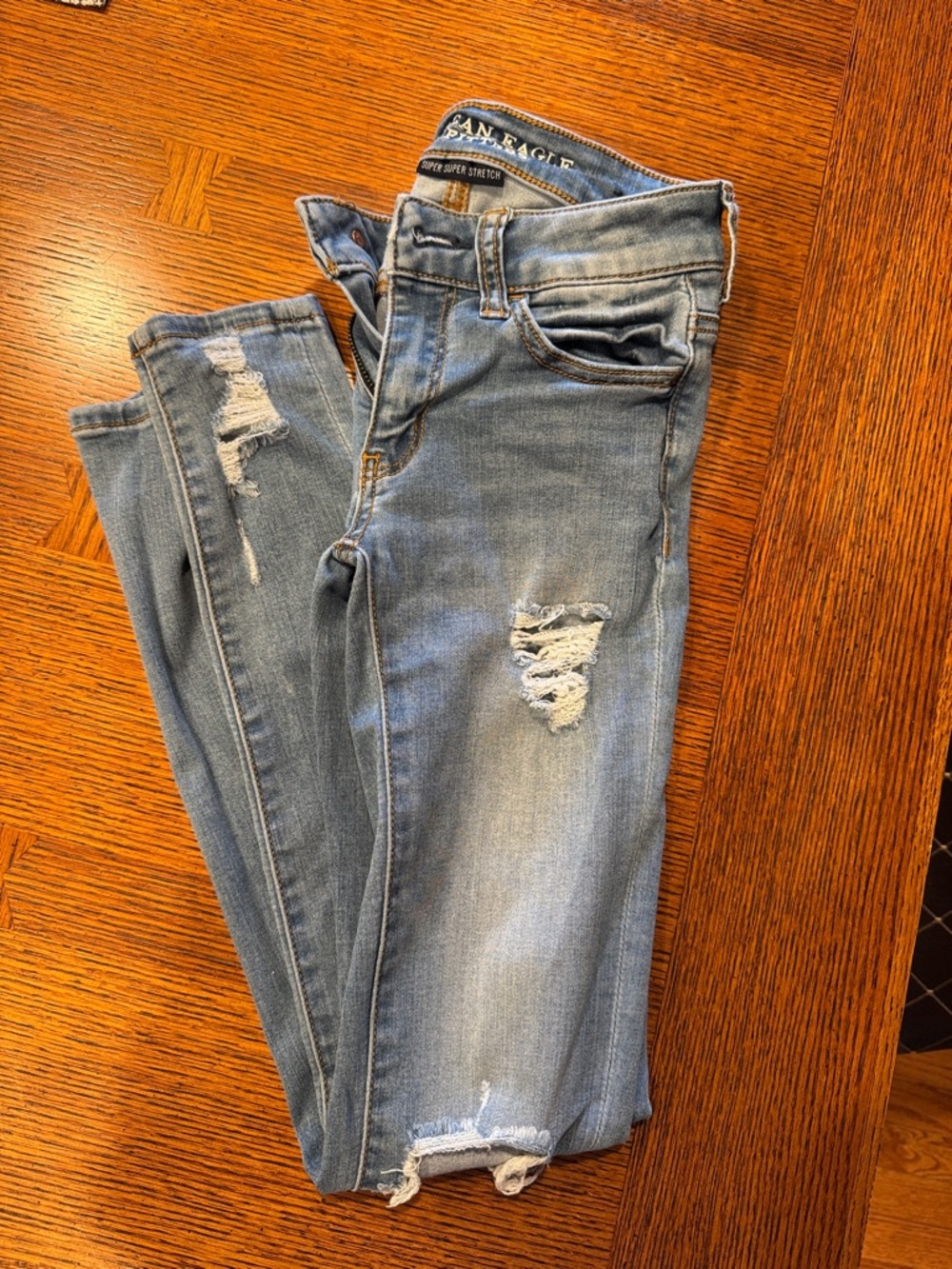 AE Light Wash Distressed Skinny Jeans